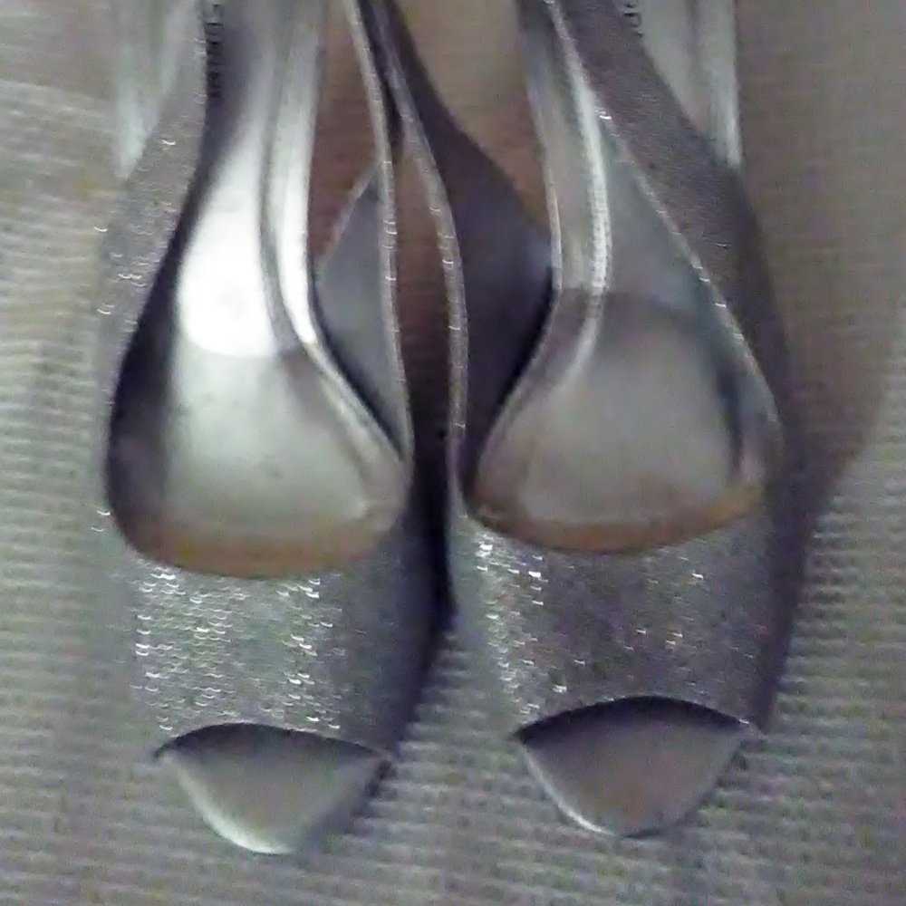 Silver high heal sling back open toed shoes